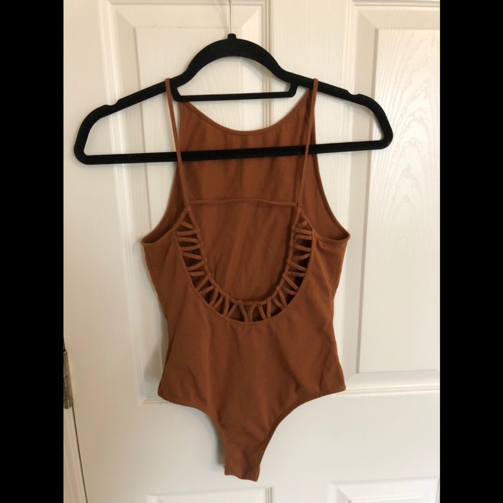 Burnt orange halter bodysuit with open back